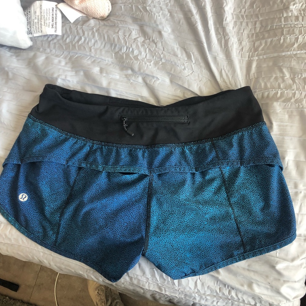 Lulu Lemon Blue speed up shorts. 2.5 inch SIZE 4